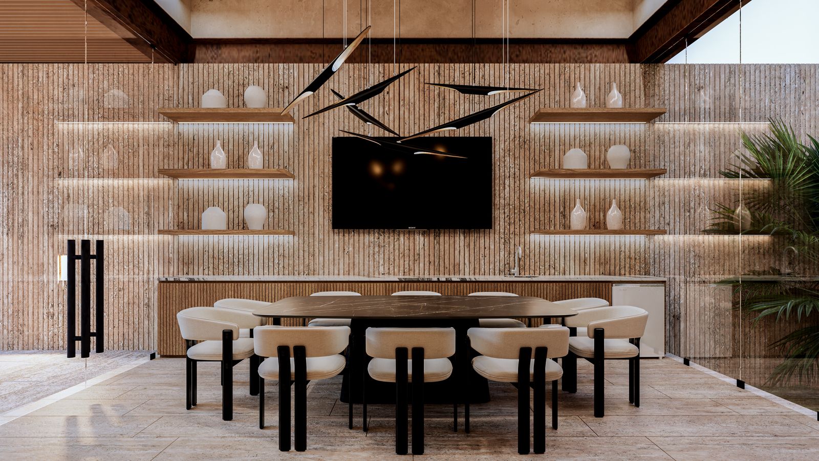 Salón de la casa club, con mesa de comedor y muro de madera